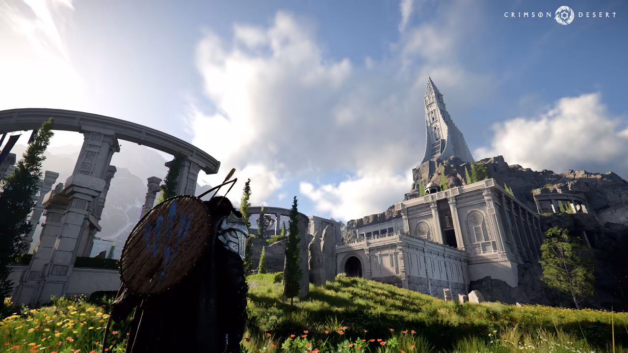 Under a bright sky with white clouds, a large pale castle with columns and arched doorways climbs a rocky, grassy hill to a tall, sharply pointed white spire. In the left foreground a man with a round painted shield on his back stands among orange flowers beside a curved stone colonnade.