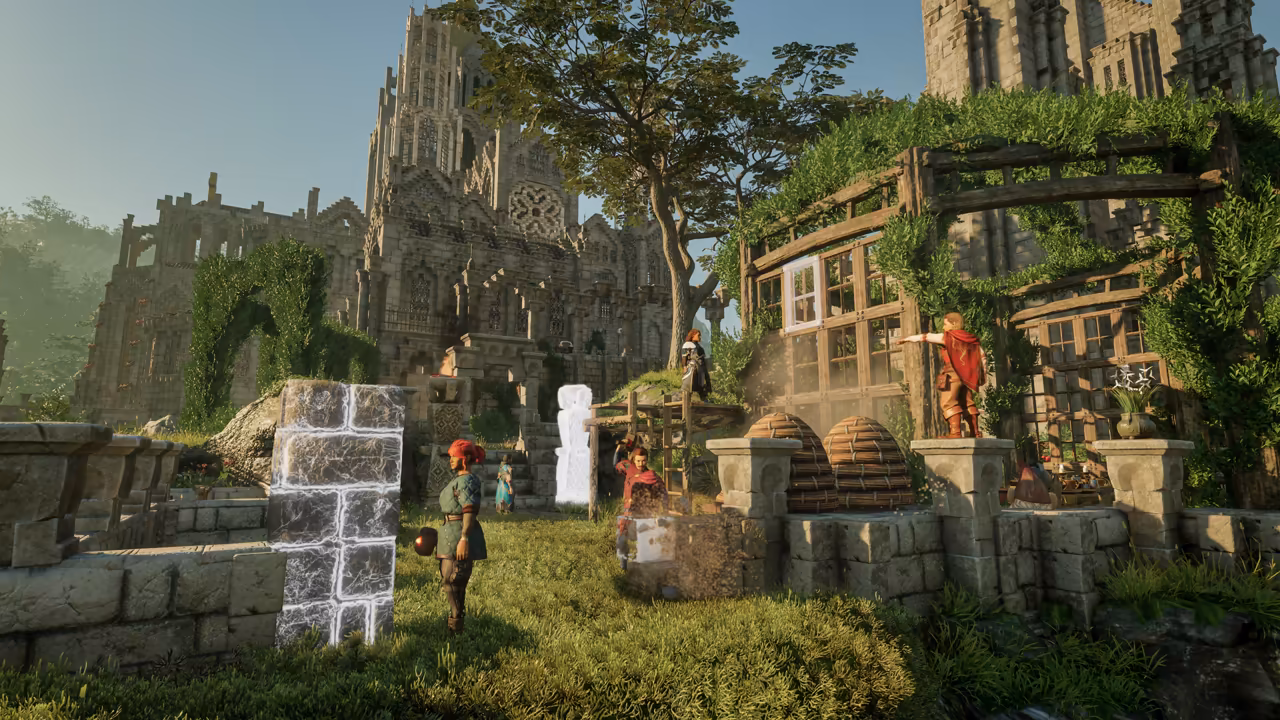 Sunlit ruins of a towering gothic cathedral with a rose window and spires fill the background. In the courtyard below, people in simple clothes stand and work on the grass among low stone walls, two straw beehives and a wooden greenhouse overgrown with vines. Two tall columns of stone blocks at left and center glow with white outlines, as if being placed. No game interface is shown.