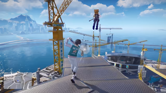 On a diamond-plate steel deck high above a harbor, a dark-haired character in a green varsity jacket and white trousers swings a golf club; a yellow tower crane with vertical Chinese safety banners stands at left, more cranes and a round domed building sit below, and a figure with a box-shaped backpack and a pipe drops from the sky at top. A city skyline and mountains line the far shore, and a minimap sits at bottom left.