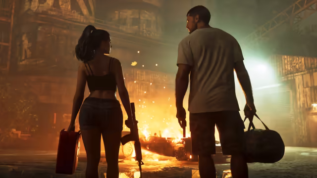 Seen from behind, a woman with a ponytail carrying a red gas can and a rifle and a man carrying a pistol and a duffel bag stand in a dim industrial yard, watching a wrecked car go up in flames and sparks.