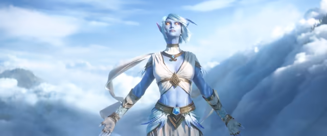 A blue-skinned woman with long pointed ears, glowing golden eyes and short pale teal hair stands with her arms held out and her face raised. She wears a cream wrap top, a gold collar and belt set with blue gems, feather-trimmed skirts and fingerless gloves, with a sea of white clouds and a blue sky behind her.