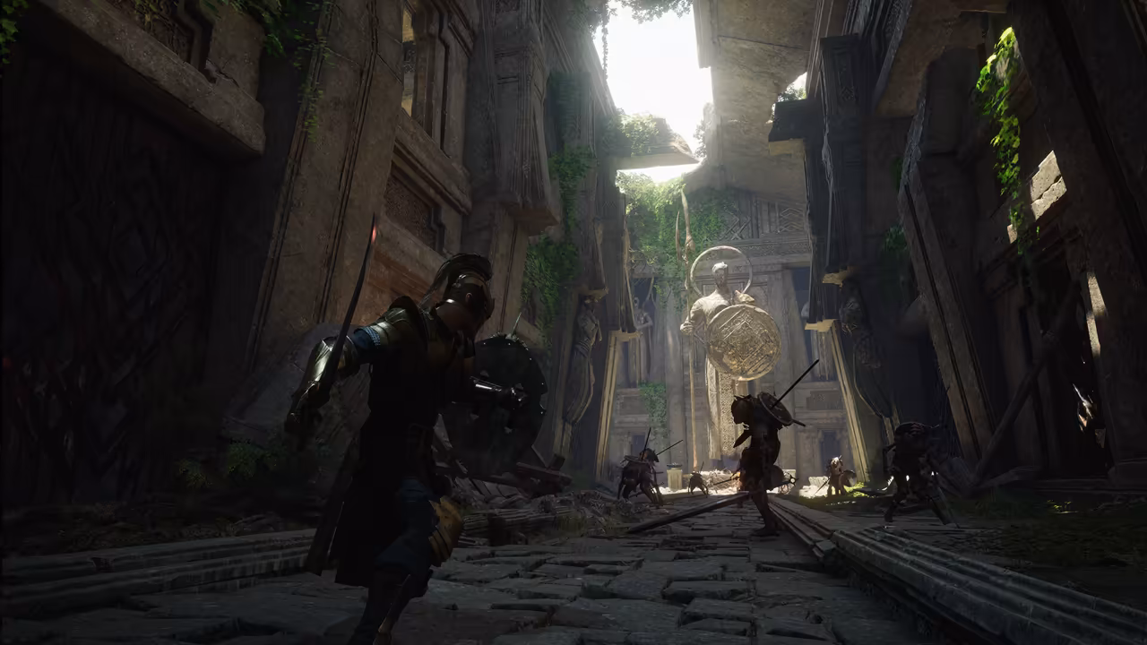 A narrow street of cracked paving stones between towering carved stone walls hung with vines. In the foreground a figure in a crested helmet and dark armor holds a long curved sword and a round shield. Farther down the street several hunched, armed creatures with spears and shields stand among broken timbers. At the far end, in a shaft of daylight, a tall stone statue holds a large round shield before a carved temple front. No game interface is shown.