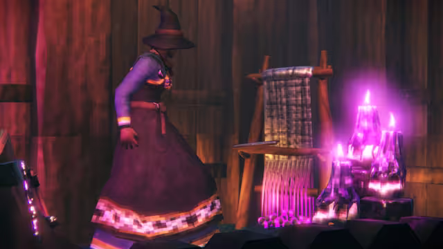 A Viking in a long purple dress and pointed hat walks past a wooden upright weaving loom and a cluster of pink glowing candles in a dark timber room.