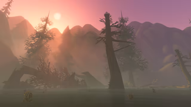 A flooded forest of tall, snapped and leaning conifers stands in calm, hazy water, with uprooted trunks and tangled branches lying on the left. Rounded mountains fade into mist behind them, and a pale sun glows in a sky shading from pink to violet.