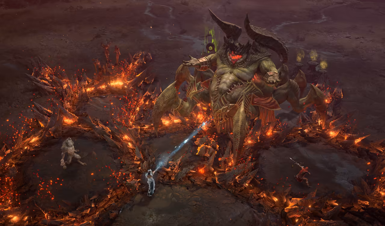 Top-down view of scorched ground. A massive horned demon with a bloated body and many curved legs towers over a circle of glowing red rock shards; three small figures fight it, one firing a white beam.