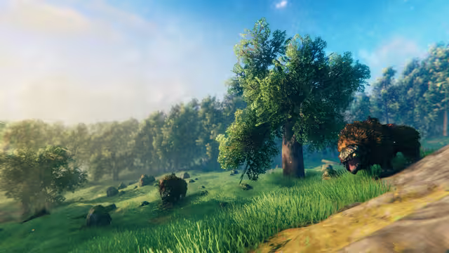 A green grassy slope with scattered rocks and a leafy tree; on the right a large shaggy lox with red harness straps on its head and a saddle on its back opens its mouth, and a second lox grazes further away