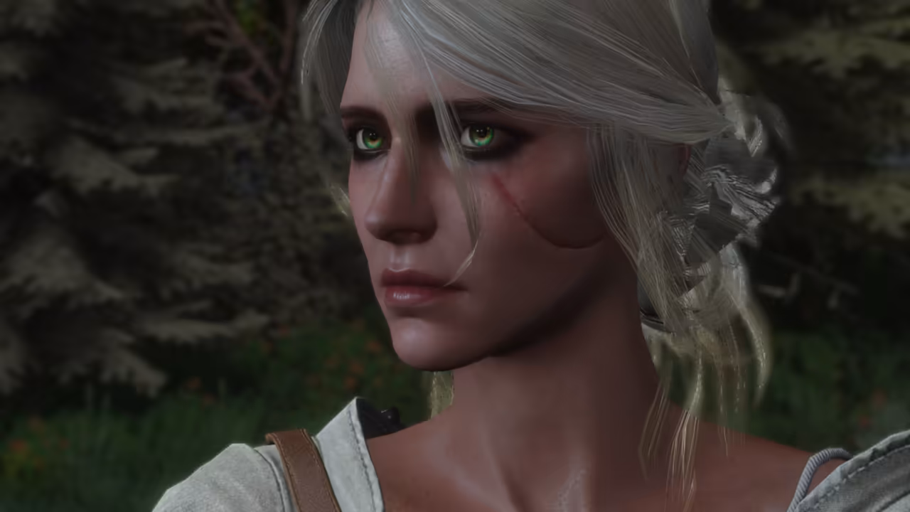 A close-up of a young woman with pale ashen hair tied back, green eyes, dark eye makeup and a long scar across her left cheek, wearing a white shirt with a leather strap over the shoulder. Dark green forest fills the background, and no game interface is shown.