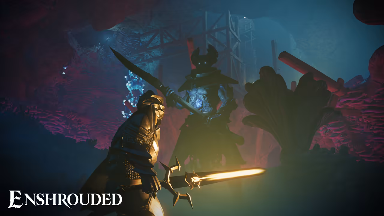 A cave lit in red and teal, with blue crystals glowing in the rock and a wooden scaffold behind. In the foreground a figure in shining gold armor holds a sword whose barbed blade glows yellow-white. Ahead looms a tall dark figure with horns and two glowing blue eyes, holding a long blade. The Enshrouded logo is at bottom left.