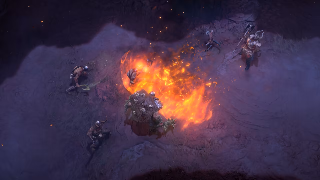 Top-down view of rocky ground at dusk. A spiral of orange fire wraps around a figure in thick furs; several horned, goat-like warriors with axes surround it.
