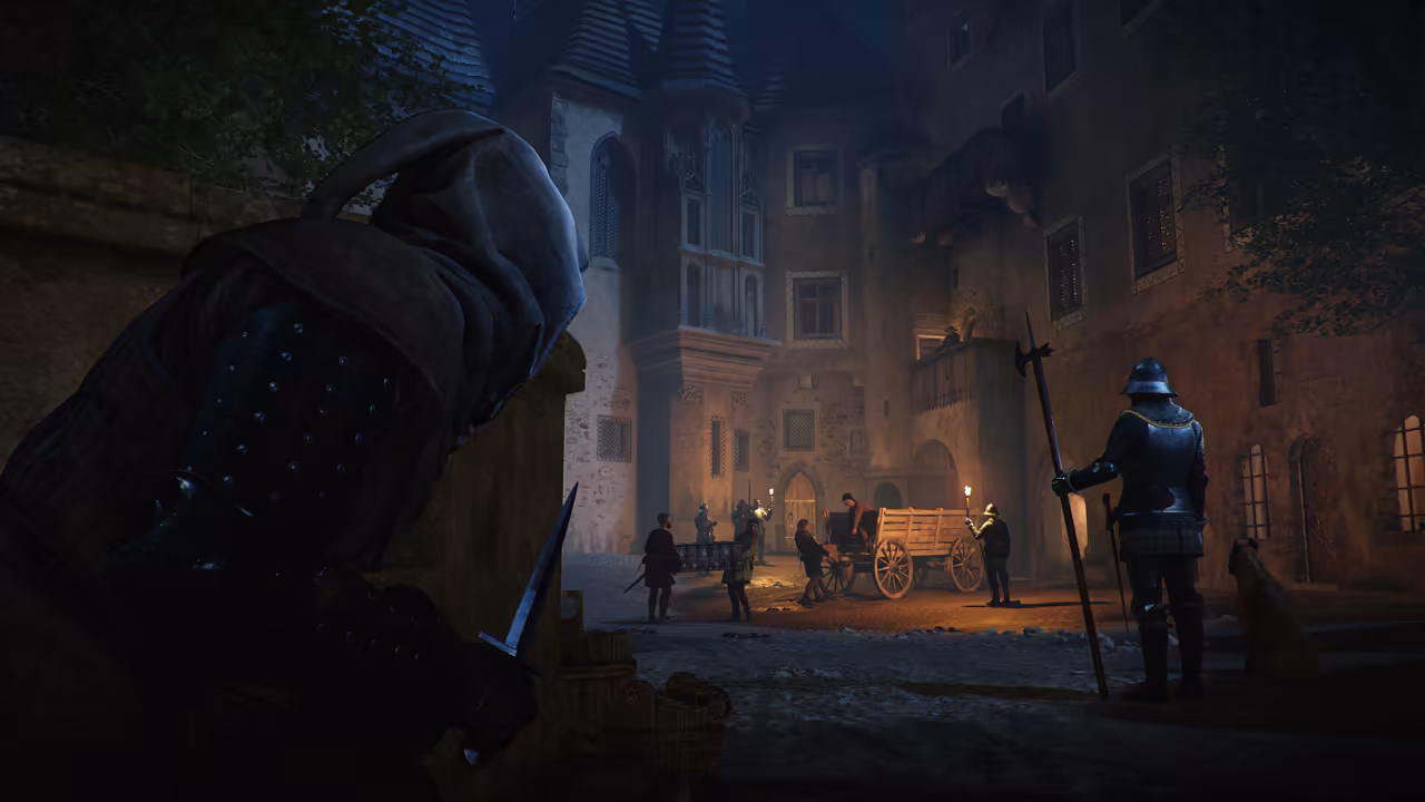 Dark view over the shoulder of a hooded man holding a dagger, looking down at a castle courtyard lit by torches: a helmeted guard with a polearm, people beside a wooden cart and tall stone buildings.
