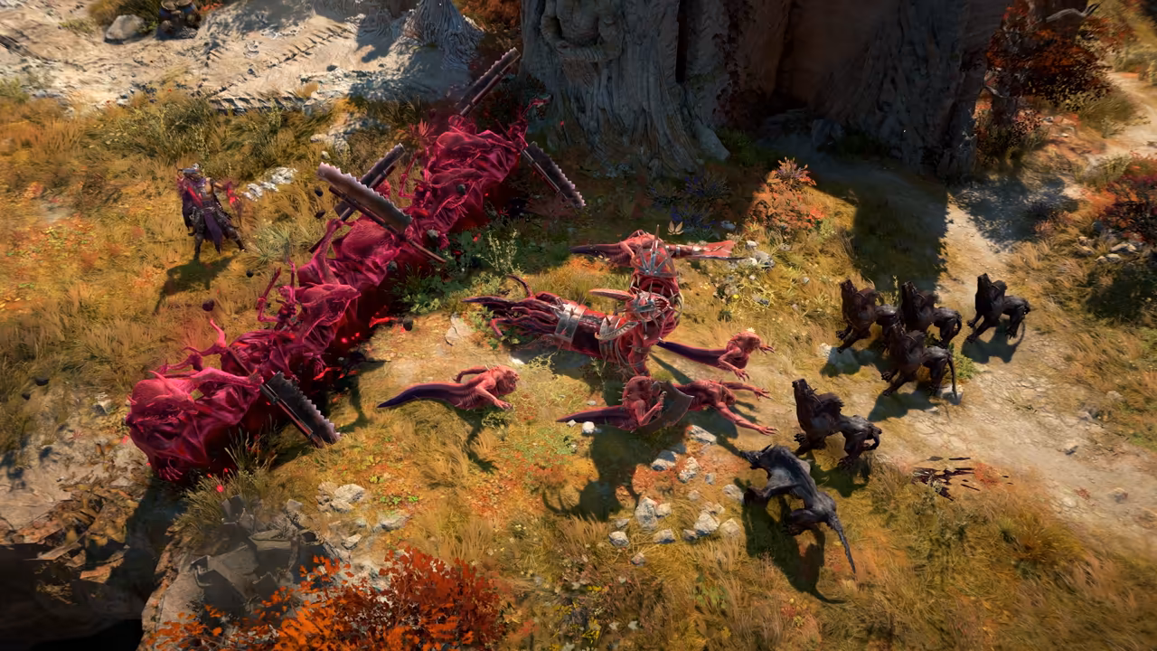Top-down view of a hillside of yellow and red grass. A twisting barrier of magenta flesh with embedded blades stretches diagonally across it; pink creatures sprawl beside it and dark wolf-like beasts gather at right.