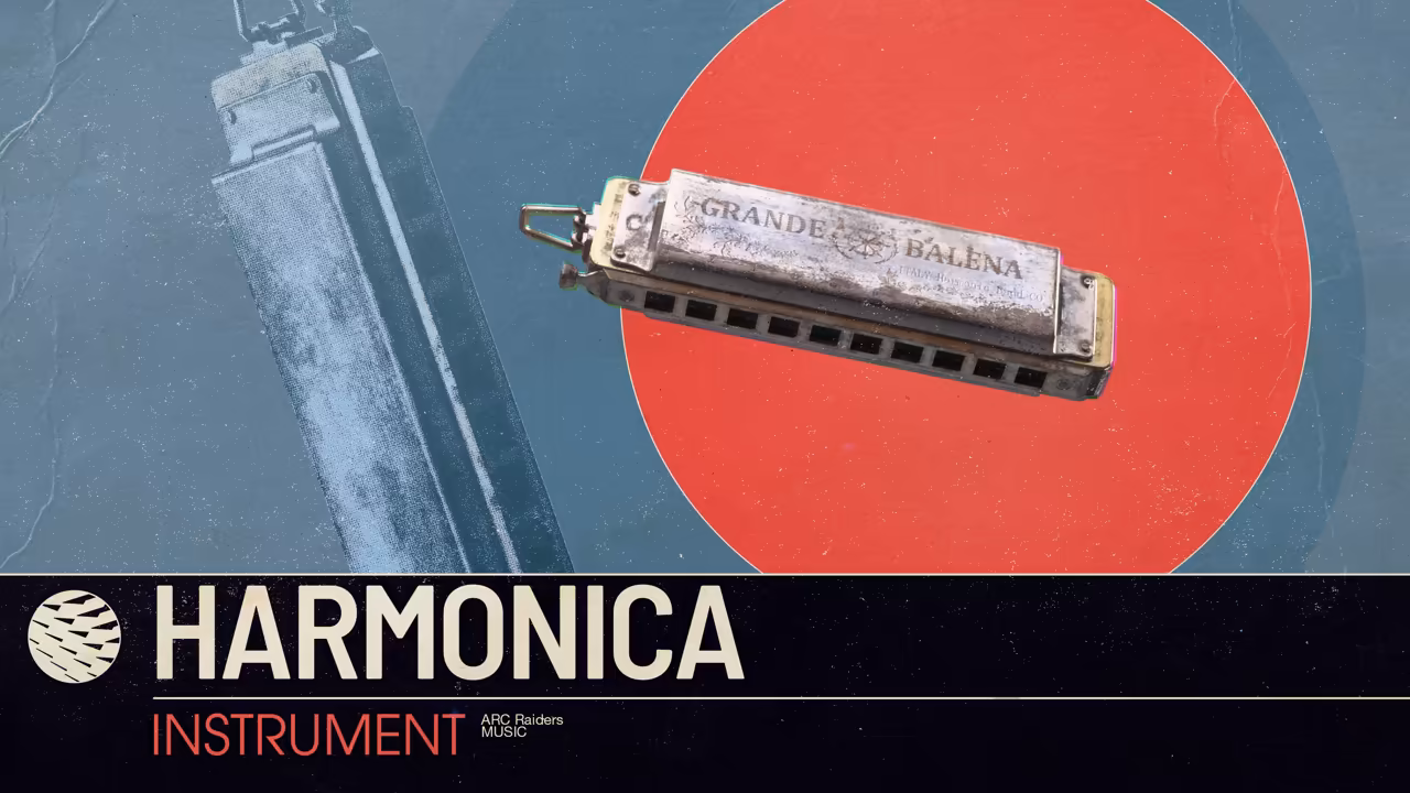 A worn silver harmonica engraved Grande Balena, in front of a red circle.
