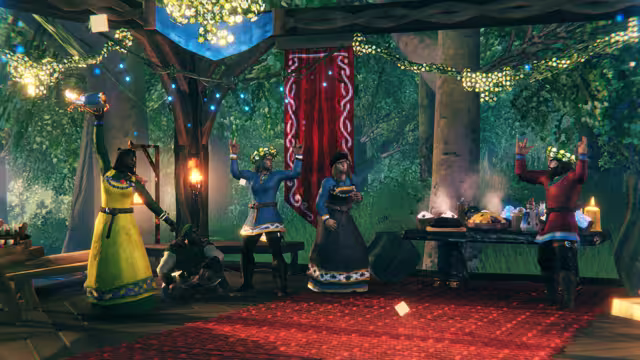 Five Vikings in bright clothes and flower crowns dance and raise mugs on a red rug under a wooden canopy strung with white flower garlands and small blue lights, a red patterned banner and a table of food behind them.