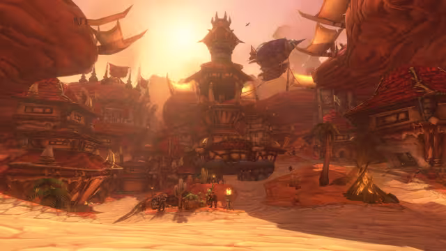 In a sandy canyon of red rock, spiked wooden buildings with red tiled roofs and hide sails surround a tall central tower, with the sun a bright glow in the haze behind it and an airship with a purple balloon to its right. Palm trees, cacti, a bonfire and a few small figures stand on the sand in the foreground, where the buildings cast long shadows.