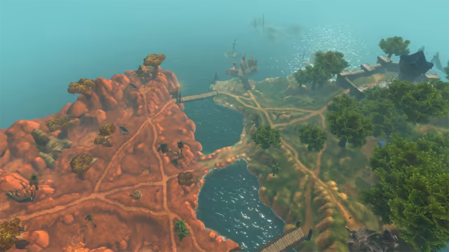 An aerial view over turquoise sea. On the left, a red rock island is crossed by dirt paths and dotted with flat-topped trees, palms, ruins and a lookout on a hill, with a wooden bridge reaching across the water. On the right, paths wind through a green island of large leafy trees toward a stone wall and a building with a dark blue roof, while sailing ships lie offshore and more islets fade into the haze.
