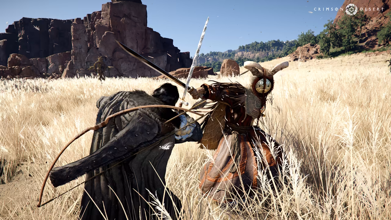 A field of tall pale grass below red cliffs. In the foreground a figure in a dark cloak, a longbow slung across his back, closes in on a fighter in a red and brown robe whose face is hidden by a round mask with two horns. The masked fighter holds a long blade upright.