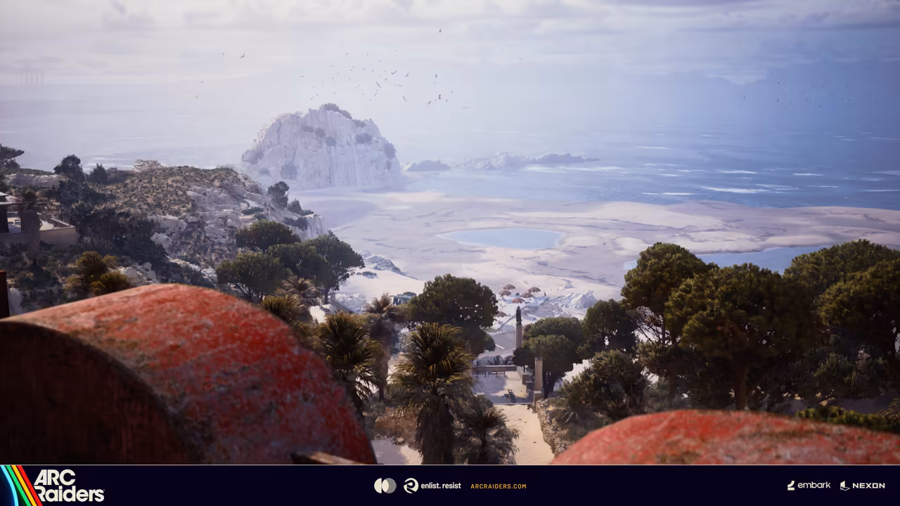 A hazy coastal panorama, roof domes in the foreground and pale water beyond.