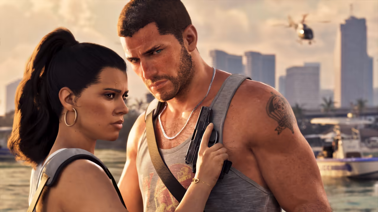 A dark-haired woman with hoop earrings and a ponytail leans against a muscular man in a gray tank top with a chain necklace and a shoulder tattoo, gripping a black pistol held against his chest. Behind them are moored boats, palm trees, tall towers and a helicopter in a hazy sky.