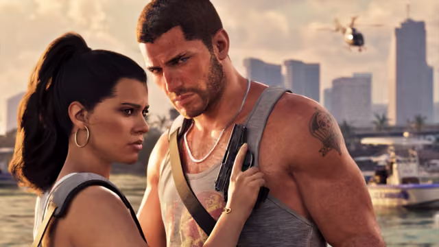 A dark-haired woman with hoop earrings and a ponytail leans against a muscular man in a gray tank top with a chain necklace and a shoulder tattoo, gripping a black pistol held against his chest. Behind them are moored boats, palm trees, tall towers and a helicopter in a hazy sky.