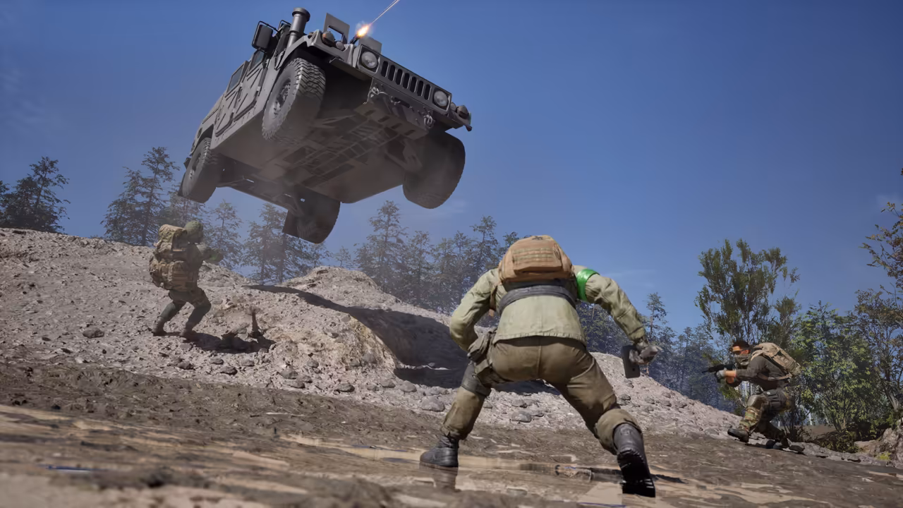 Low view of a gravel slope: a dark four-wheeled armored vehicle with a roof gun is in the air at the top of the ridge while three soldiers below, one in a green armband, scatter with weapons.