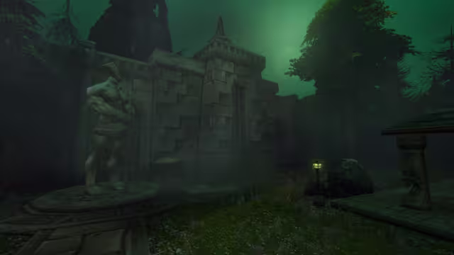 On a round carved plinth at left, a stone statue of a bare-chested man holding a staff stands before a high stone wall with a pointed turret, under a glowing green sky. A single lamp post glows green on the overgrown grass, and dark trees and a small roofed shrine frame the scene.