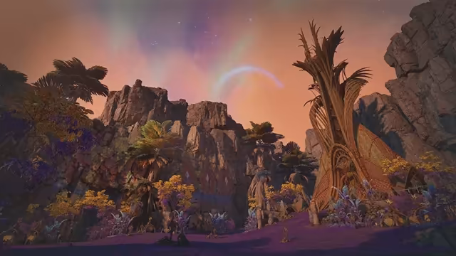 Under a pink and violet sky with a faint arc of light, rocky cliffs rise behind a settlement of small huts among palm-like trees, golden shrubs and purple undergrowth, beside a tall twisted tree trunk shaped like a giant woven spire on the right.