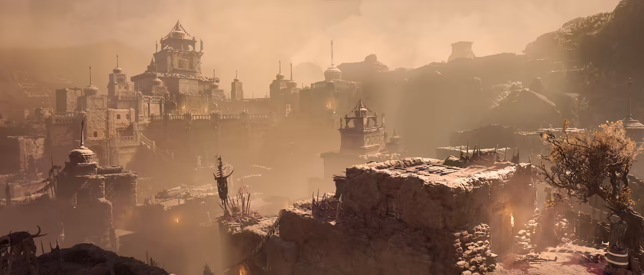 A dusty, sun-hazed hill town of tan brick buildings with small domes and towers, walls stepping down a rocky slope, a crude banner on a pole in the middle and a gnarled tree on the right.