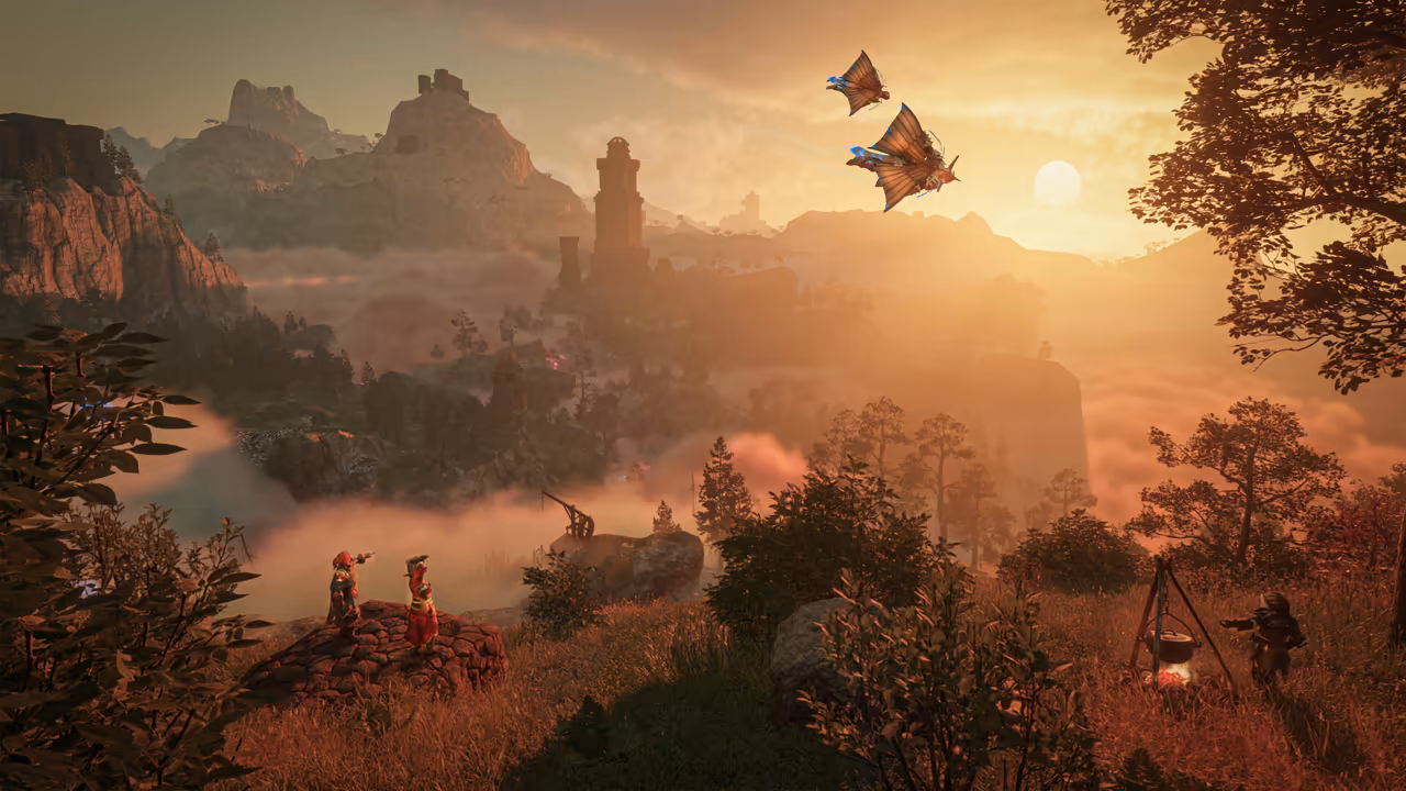 Golden sunset light over a wide valley filled with drifting fog. In the foreground two small figures stand on a mound of stones, one pointing a small weapon into the distance, and at right a third figure stands beside a pot hanging from a tripod over a fire. Two large winged creatures with ray-like wings fly across the sky, a tall ruined stone tower rises from the mist in the middle distance, and rock spires and mesas line the horizon. No game interface is shown.