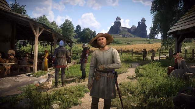 Sunny village scene: a man in a broad straw hat and plain gray tunic stands on a path beside a hen; behind him men in mail, people eating under a timber shelter, a wheat field, and on a far hill a castle built on two tall rocks.