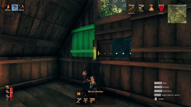 In-game screenshot inside a dark wooden hut: a Viking holds a hammer and places a green-highlighted wooden shutter over a window, with Resting, Shelter, Fire and Rested status icons at the top right.