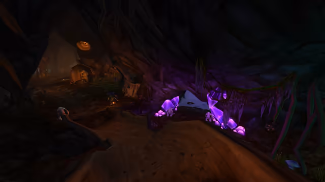 A dark cave path winds past twisted roots toward a wooden dwelling with a round door glowing orange in the distance. At right, large glowing purple crystals frame an opening where two pale furbolgs stand, while another pale furbolg and a dark green furbolg carrying a lantern walk along the path.