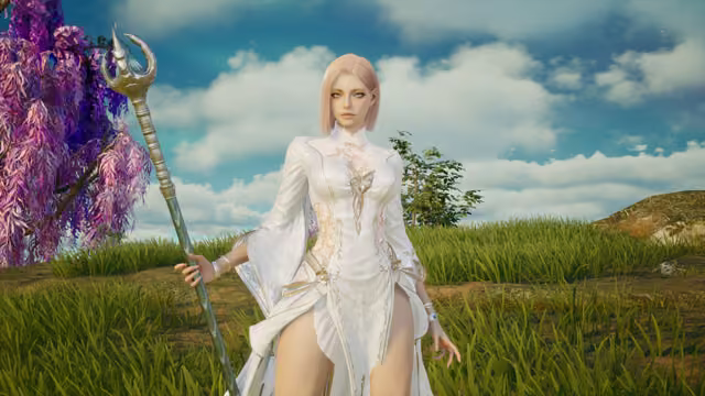 A pale-haired woman in a long white robe with gold embroidery stands in tall green grass holding a silver staff topped with a curved ornament; a tree with drooping pink and purple leaves stands on the left under a blue sky with white clouds.