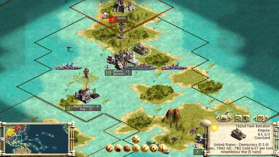 Isometric map of islands with dotted borders, gray battleships beside a coastal city labeled Manila 13, and a tank inside a white selection ring. A panel reads 192nd Tank Battalion, Regular, United States Democracy, Jan 1942 AD, Amphibious War.
