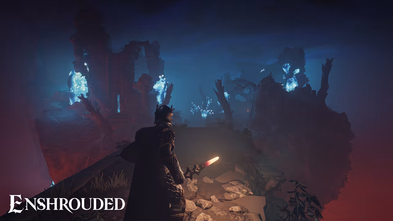 Thick fog tinted deep blue above and red below hides a ruined landscape. In the foreground a figure in dark armor and a hood holds out a torch with a red glowing tip. Broken stone walls, bare twisted trees and clusters of glowing blue crystals loom in the murk. The Enshrouded logo is at bottom left.