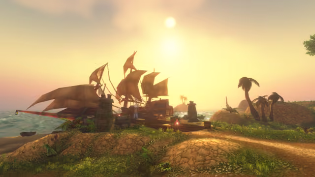 Backlit by a hazy sun, a big wooden ship with patched sails is tied up at a plank dock with torches and two square stone pillars, near a sandy beach where a small rowing boat lies. Grassy dunes and a dirt path lead to palm trees on the right.