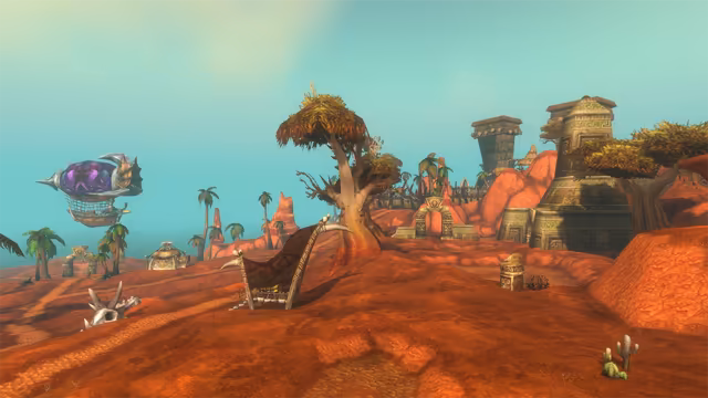 Under a pale turquoise sky, an airship with a spiked metal nose and a patterned purple balloon floats on the left above palms and a small stone arch. Across rolling red earth lie a horned animal skull, a hide lean-to on bone poles and a gnarled flat-topped tree, with carved stone arches, a square tower and a tall stepped temple tower on the right.