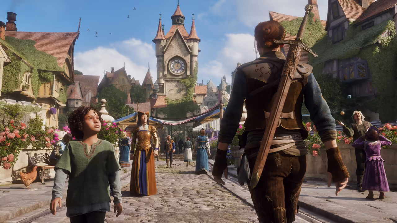 Sunny town street. At right a figure with red hair tied back and a large sword across the back walks away from the viewer. At left a child with curly dark hair in a green tunic looks up at the hero; behind, a woman in a long gold and blue gown, people in period clothes, a juggler at right and a market stall with blue awnings line the street. Ivy-covered timbered houses, pink rose beds and a chicken by a bench lead to a stone clock tower with red spires. No game interface is shown.