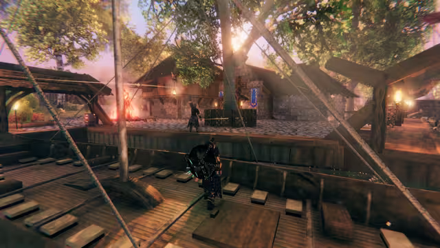 A player on the deck of a docked longship looking up at wooden Viking houses, a campfire and trees in the Meadows