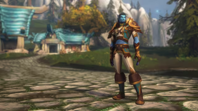 A tall blue-skinned man with long pointed ears, dark swept-back hair, a short beard and glowing eyes stands on a cobbled road in cream, brown and teal leather armor with gold shoulder guards and heavy brown boots. Out of focus behind him are houses with curved teal roofs, a tree with yellow leaves and pale cliffs.