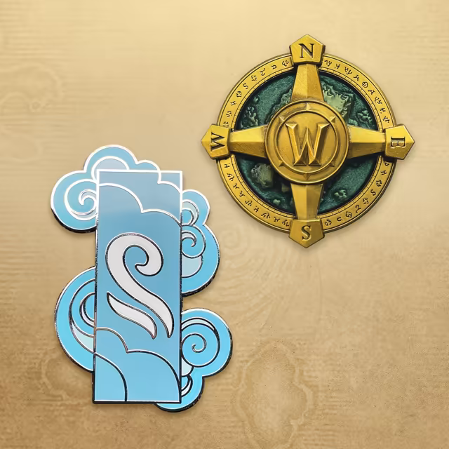 Two pins on a parchment background. One is a raised gold compass rose with N, E, S and W points, a W emblem at its center over a green relief map and a ring of runes. The other is a pale blue enamel pin outlined in silver, a tall panel with a white wind swirl framed by curling clouds.