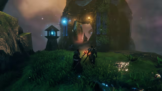 Night scene in the Mistlands: two Vikings in dark armor, one with a glowing red-gemmed sword, stand on bright green grass beside a blue dvergr lantern on a post, looking up a stone stair towards a huge doorway in a mossy stone tower where a third figure in a pointed hood stands in the light