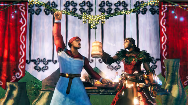 Two Vikings under red and white knotwork banners and a garland of lights: a man in a blue tunic and red cap raises his fist while a woman in a feathered red outfit holds up a wooden mug
