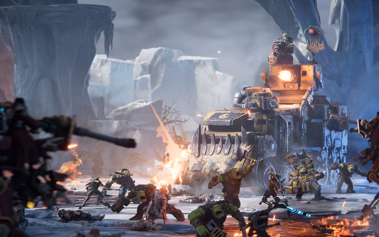 Pale blue ice cliffs behind a rusty tracked vehicle with an orange tower; green Orks and smoke in the snow.