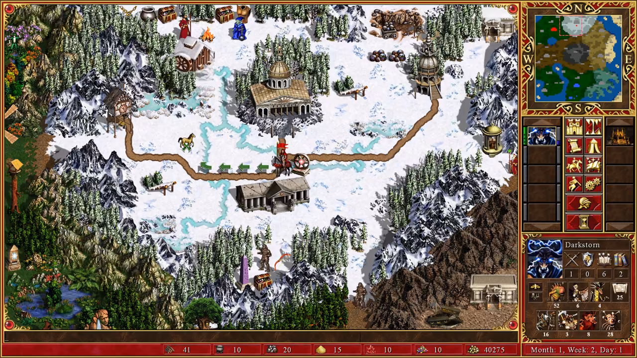 A top-down winter landscape of white snow, pine trees and pale blue frozen streams. A domed building with columns sits on a hill, a wooden lodge stands below, and brown roads wind between them. The minimap and hero panel are at right.